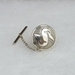 Sterling silver tie tack with Mimbres Mountain Sheep design, 5/8 inch diameter.