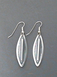 Long strip sterling silver earrings with The Silver Mesas hand stamped Feather design. 