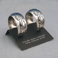 Side view-Sterling silver post hoop earrings with The Silver Mesas Pueblo Scroll design.