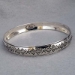 Sterling silver bangle with hand stamped Butterfly design.  Native American made.