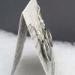 Side view of Mimbres bowl style sterling silver earrings.