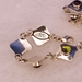Back view of sterling silver link bracelet with natural amethyst and peridot by The Silver Mesa.