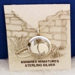 Sterling silver Mimbres pendant, 3/4 inch diameter, Wave design.