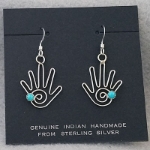Sterling silver hand earrings by Marilyn Preston, Navajo.