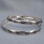 Sterling silver bangle with hand stamped Butterfly design.  Native American made.