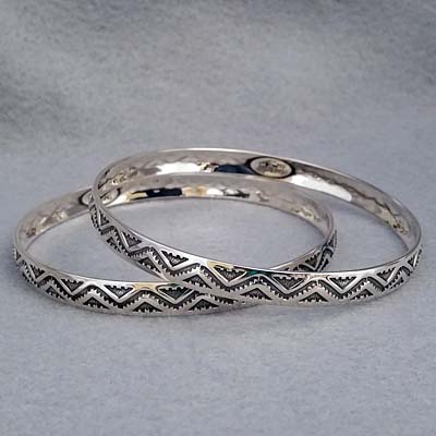Sterling silver bangle with hand stamped Lightning design.  Native American made.
