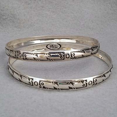 Sterling silver bangle with hand stamped Bird design.  Native American made.