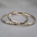 Sterling silver bangle with hand stamped Wings design.  Native American made.
