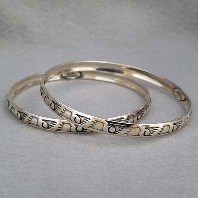 Sterling silver bangle with hand stamped Wings design.  Native American made.