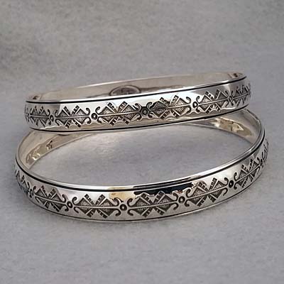 Sterling silver bangle with hand stamped Butterfly design.  Native American made.
