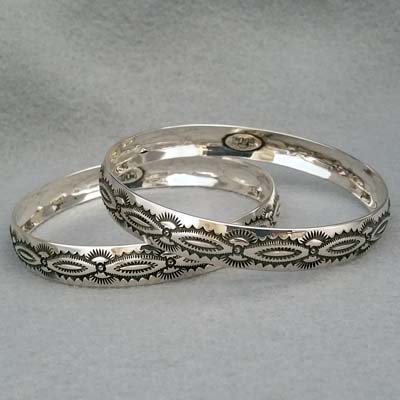 Sterling silver bangle with hand stamped Navajo Scallop design.  Native American made.