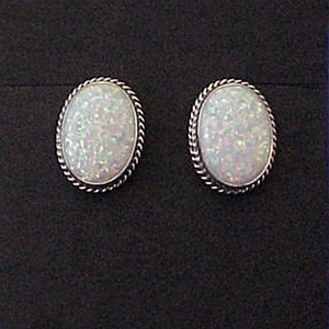 Wholesale sterling silver earrings with high quality imitation Opal; clips, posts and wires.  Made in USA.
