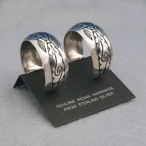 Side view-Sterling silver post hoop earrings with The Silver Mesa's Pueblo Scroll design.
