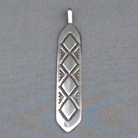 Sterling silver strip pendant with The Silver Mesas hand stamped Diamond Back design.