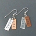 Sterling and copper earrings with XOXO and LOL.